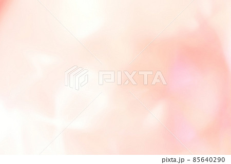 淡いピンク系のシンプルで幻想的な抽象的模様の背景素材の写真素材