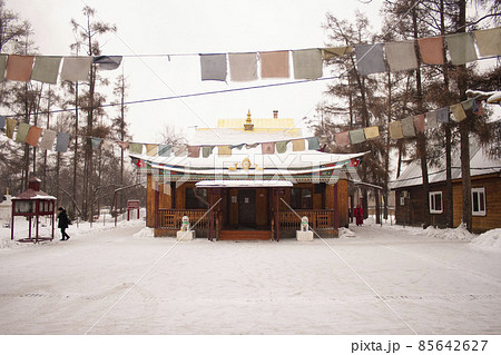 Buddhist temple Tibetan tradition in the snow. Buryatia, Siberia, Russia. Tourism on Lake Baikal 85642627