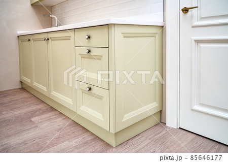 Classic style kitchen furniture set and white door in room Classic style kitchen furniture set and white door in room 85646177