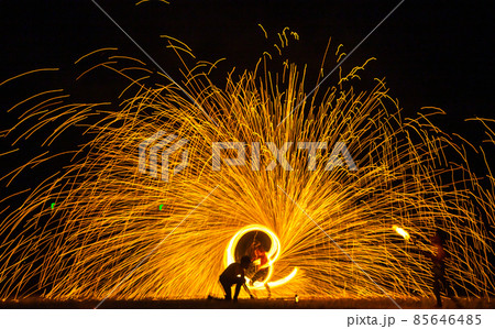 Fire show on the beach at night in Phuket, Thailand 85646485
