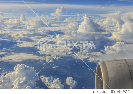 Aerial picture of clouds from airplane with airplane engine 85646924