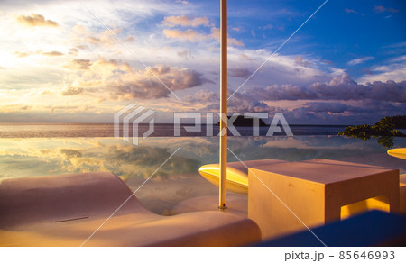 Sunset at the edge of a swimming pool at Kata beach in Phuket province, in Thailand 85646993