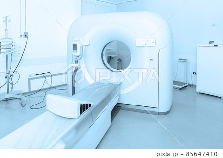 Medical CT or MRI Scan in the modern hospital laboratory. Interior of radiography department. Technologically advanced equipment in white room. Magnetic resonance diagnostics machine. 85647410