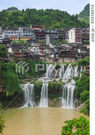 Furong, China - May 29, 2018: Furong ancient village and waterfall in Hunan Furong, China - May 29, 2018: Furong ancient village and waterfall in Hunan 85648659