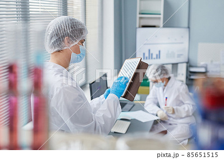 Scientist using tablet pc at the lab Scientist using tablet pc at the lab 85651515