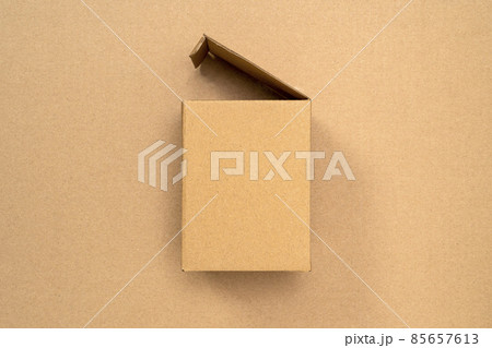 Flat lay of empty open cardboard box Flat lay of empty open cardboard box 85657613