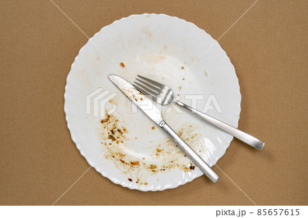 An empty plate, dirty after the meal is finished 85657615