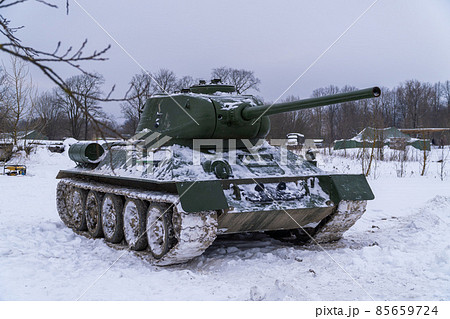 Russia. Saint-Petersburg. Krasnoselsky district. December 12, 2021. The legendary Soviet T-34-85 tank of the 1943 model in the parking lot in the family historical tank park Steel Landing. 85659724