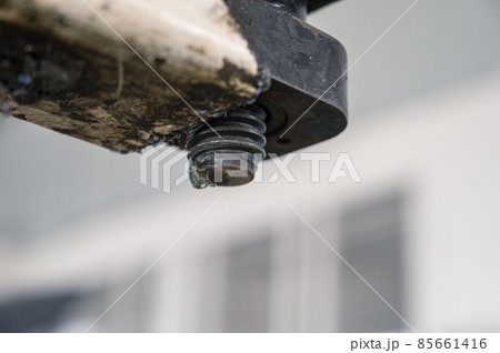 Dirty thread of the car lift machine with grease in workshop Dirty thread of the car lift machine with grease in workshop 85661416