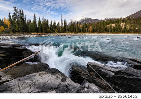 Athabasca Falls rapids flowing at sunset in Icefields Parkway at Jasper national park Athabasca Falls rapids flowing at sunset in Icefields Parkway at Jasper national park 85661455
