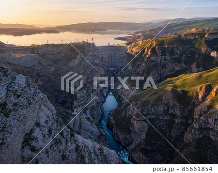 Spring mountain texture, mountain terrain in Dagestan. Morning view of hydroelectric power station on the Sulak river near the village of Dubki. Russia. Spring mountain texture, mountain terrain in Dagestan. Morning view of hydroelectric power station on the Sulak river near the village of Dubki. Russia. 85661854