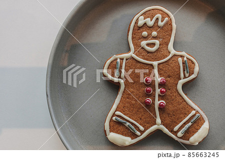 Gingerbread man cookies served in grey dish. Gingerbread man cookies served in grey dish. 85663245