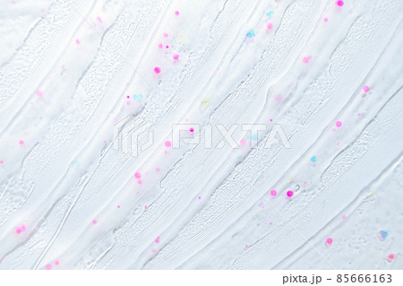 Abstract rainbow colored glitter particles. Macro of kids toy slime. Closeup view of colorful slime splash. Rainbow palette. Wallpaper for school banner or handmade masterclass.  85666163