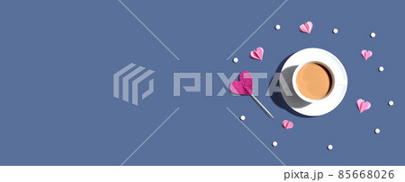 A cup of coffee with hearts A cup of coffee with hearts 85668026