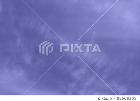 Abstract template with blue sky, white clouds and waxing half moon toned in trendy color of year 2022. Beauty of nature concept. Abstract natural background with copy space. 85668305
