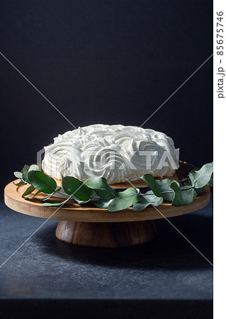 close up of zephyr cake on wooden stand 85675746