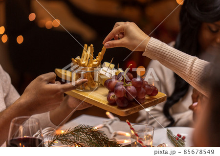 close up of people share food at christmas dinner 85678549