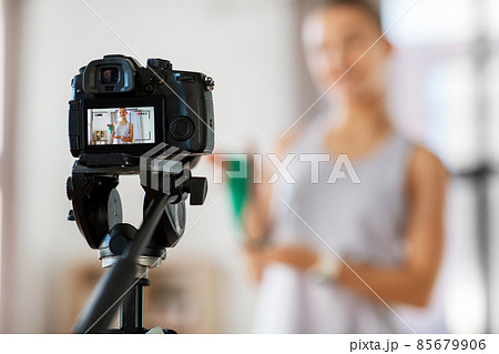 teenage girl or blogger recording gym class video 85679906