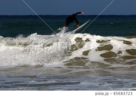 Surfing big waves in the Mediterranean Sea off the northern coast of Israel 85683723