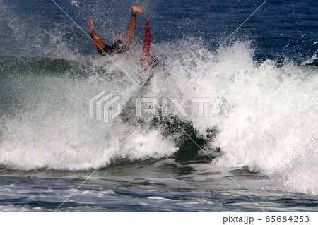 Surfing big waves in the Mediterranean Sea off the northern coast of Israel 85684253