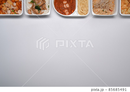Top view of various frozen meal against on white background with copy space. 85685491