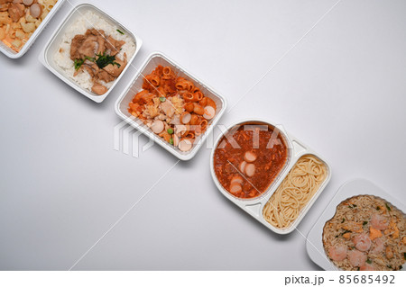 Above view of various frozen meal against on white background. 85685492