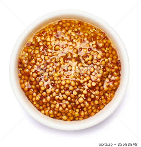 Classic Dijon mustard sauce in ceramic bowl isolated on white background Classic Dijon mustard sauce in ceramic bowl isolated on white background 85688849
