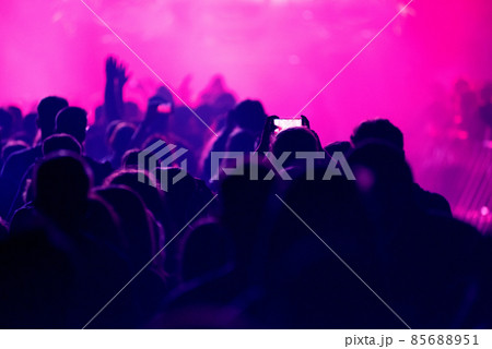 Crowd of people celebrating the New Year's Eve at a party Crowd of people celebrating the New Year's Eve at a party 85688951