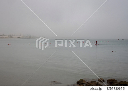 Dream sports scene banner in the mist at dawn in the calm sea. Dream sports scene banner in the mist at dawn in the calm sea. 85688966