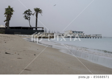 Beach scene banner and dream homes in the mist at dawn in the calm sea. 85688971