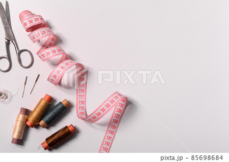 sewing tools and accessories on a white background. copy space 85698684