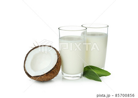 Pitcher of coconut milk isolated on white background Pitcher of coconut milk isolated on white background 85700856