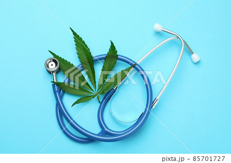 Medicinal cannabis concept on blue background, top view 85701727