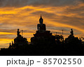 silhouette of a buddha statue 85702550
