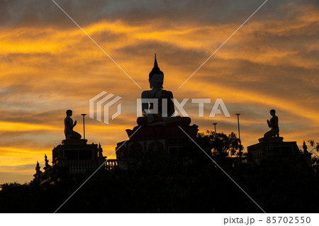 silhouette of a buddha statue silhouette of a buddha statue 85702550