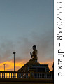 silhouette of a buddha statue 85702553