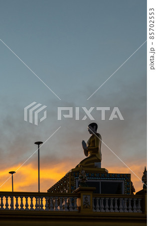 silhouette of a buddha statue silhouette of a buddha statue 85702553