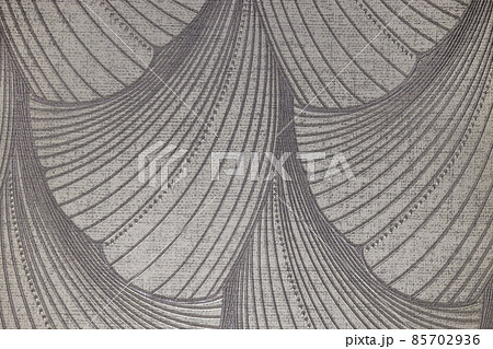 vintage textile tapestry background texture with a glossy texture 85702936