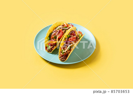 Traditional Mexican tacos with meat and vegetables 85703653