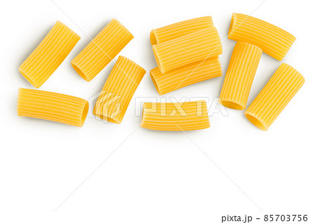 raw italian Rigatoni pasta isolated on white background with clipping path and full depth of field. Top view with copy space for your text. Flat lay raw italian Rigatoni pasta isolated on white background with clipping path and full depth of field. Top view with copy space for your text. Flat lay 85703756