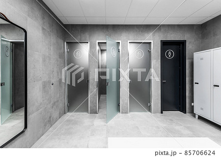 Modern minimalist interior of public shower room with grey clay wall 85706624
