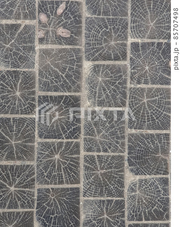 wooden paving blocks covered with seaside sand , abstract background, texture , vertical wooden paving blocks covered with seaside sand , abstract background, texture , vertical 85707498