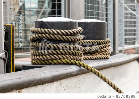 Ships rope or rope tied to a mooring bollard. 85708599