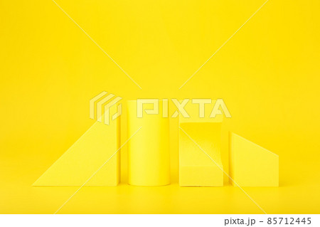 Abstract futuristic background in monochromatic yellow colors with copy space. Different geometric figures in a row 85712445