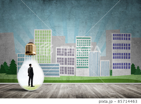 Businessman trapped in bulb 85714463
