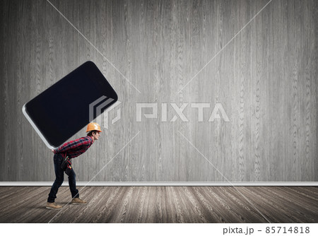 Builder man carry huge smartphone 85714818