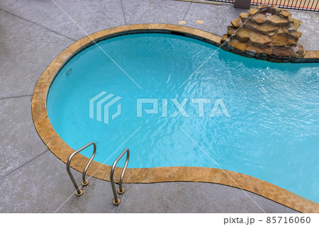 A swimming pool is with water used for swimming other water activities A swimming pool is with water used for swimming other water activities 85716060