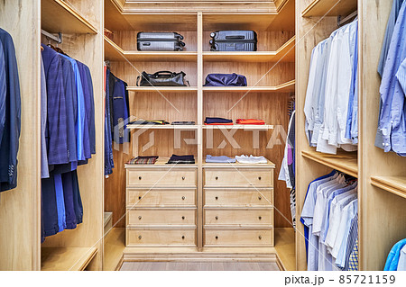 Stylish walk in closet with furniture made of maple wood 85721159
