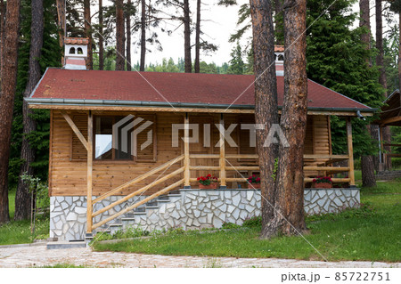 Cozy bungalow in a picturesque mountain campsite in Bulgaria, Eastern Europe in the Rhodope Mountains Cozy bungalow in a picturesque mountain campsite in Bulgaria, Eastern Europe in the Rhodope Mountains 85722751