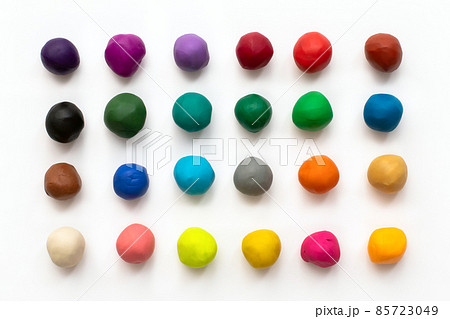 Pieces or balls of Colorful plasticine modelling clay isolated on white background. Top view with shadow. Creativity children toys concept. 24 colors set. Pieces or balls of Colorful plasticine modelling clay isolated on white background. Top view with shadow. Creativity children toys concept. 24 colors set. 85723049